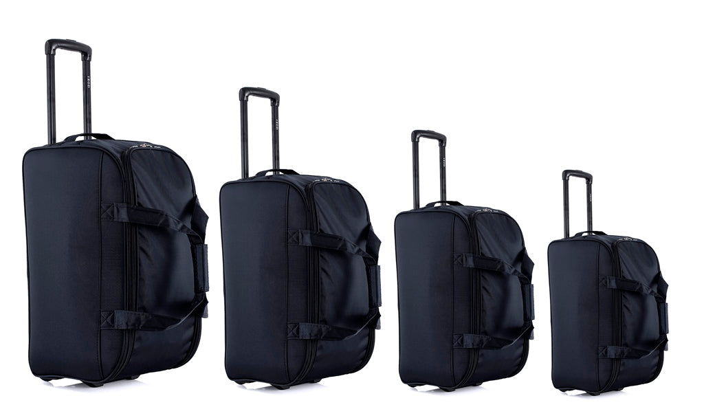 Four black suitcases of different sizes on a white background