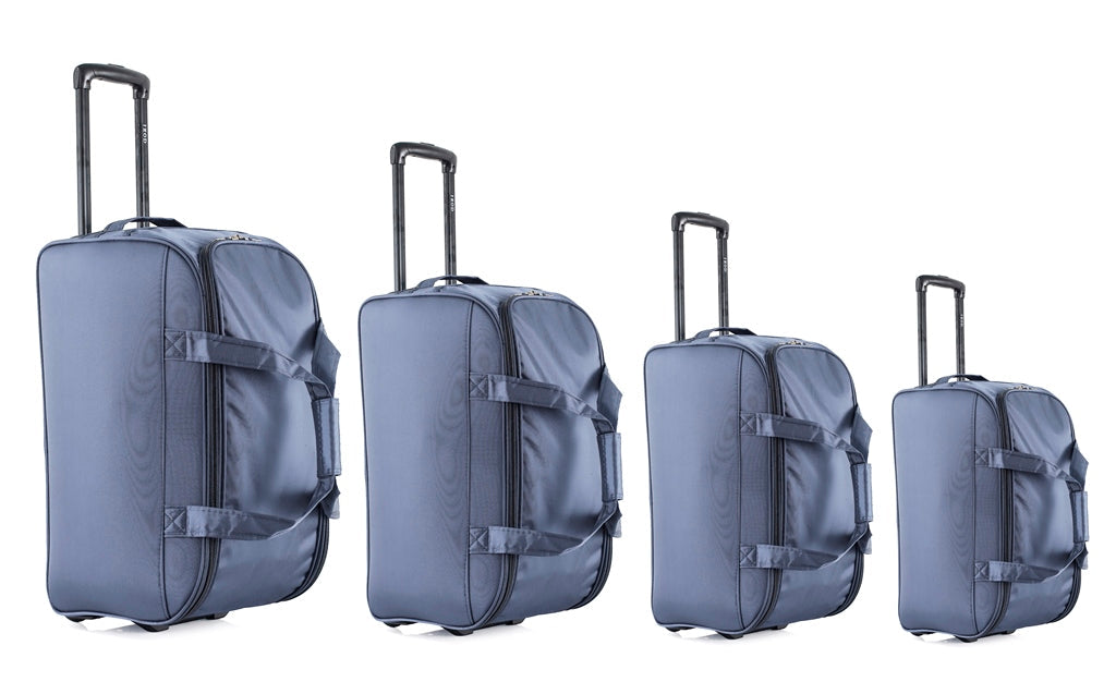 Four gray suitcases of different sizes on a white background