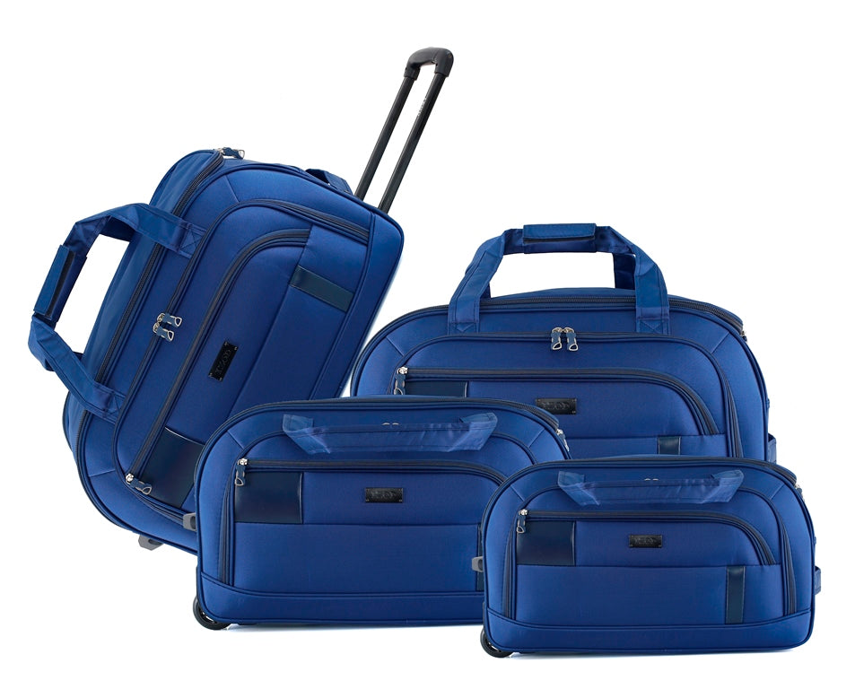 Set of blue suitcases of different sizes on a white background