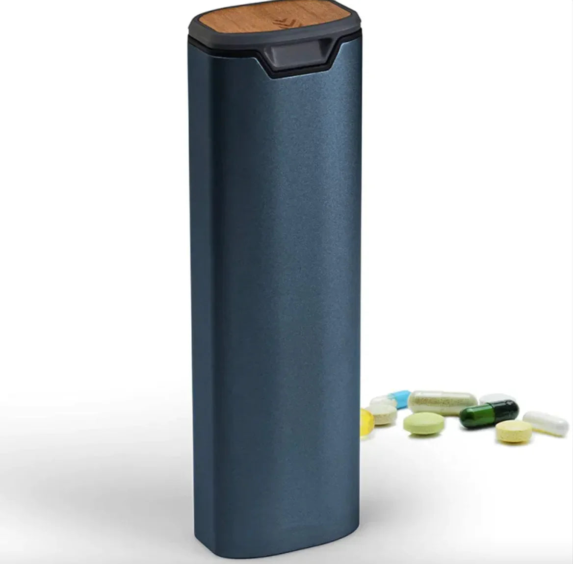 Blue pill organizer with wooden top on a white background