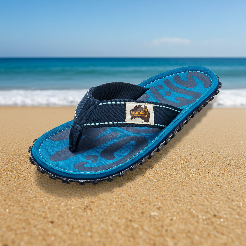 Blue and black sandal with brand logo on a white background