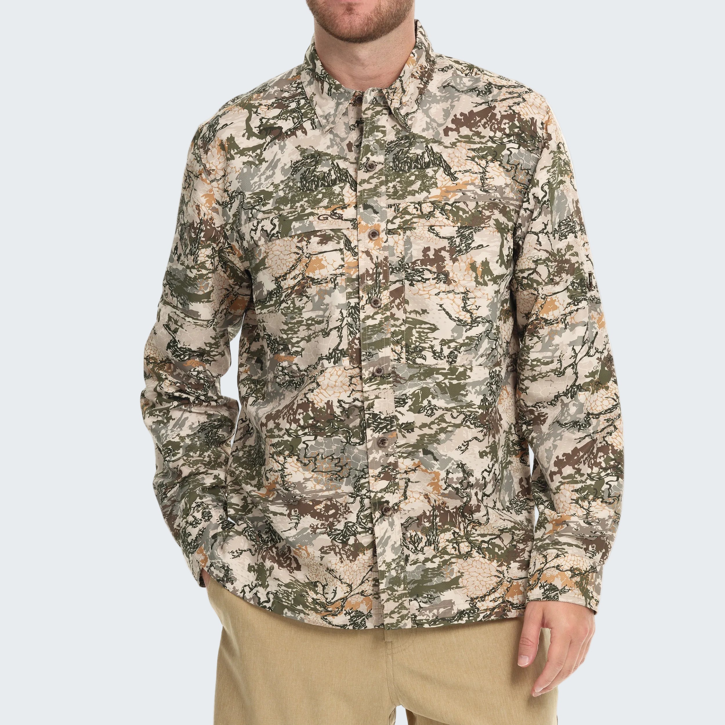 Camouflage shirt worn by a person on a white background