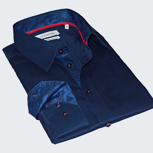 Folded navy blue shirt with red accents on a white background