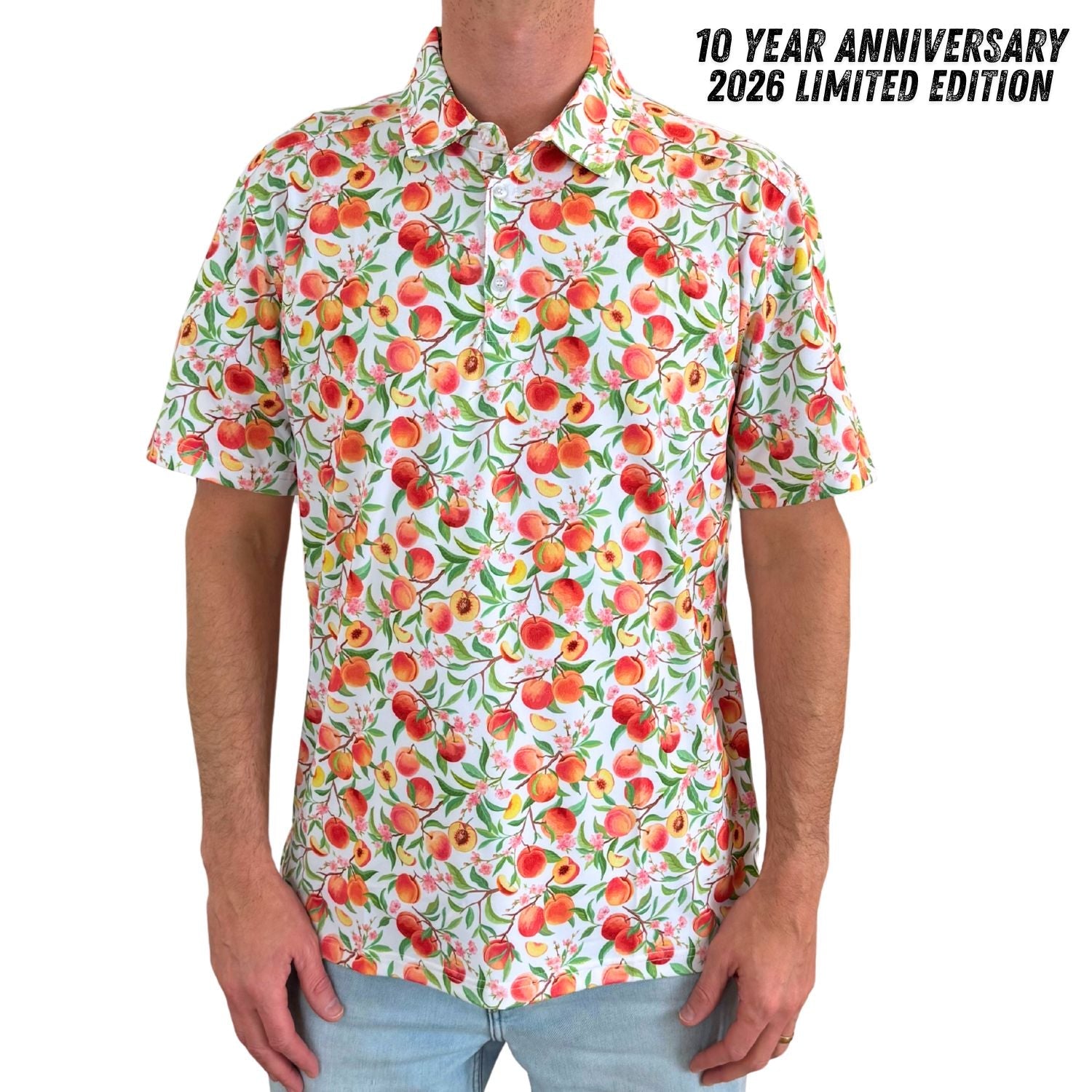 Person wearing a colorful shirt with fruit pattern, labeled '10 Year Anniversary 2026 Limited Edition'.