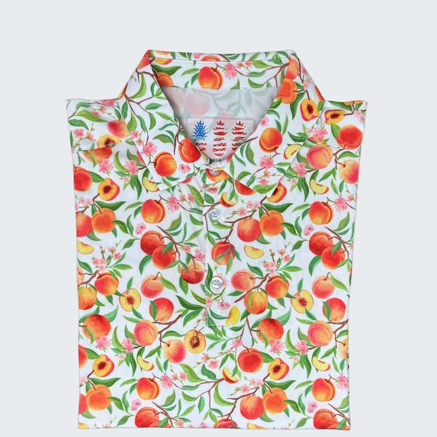 Peach patterned shirt with 10 Year Anniversary 2026 Limited Edition text