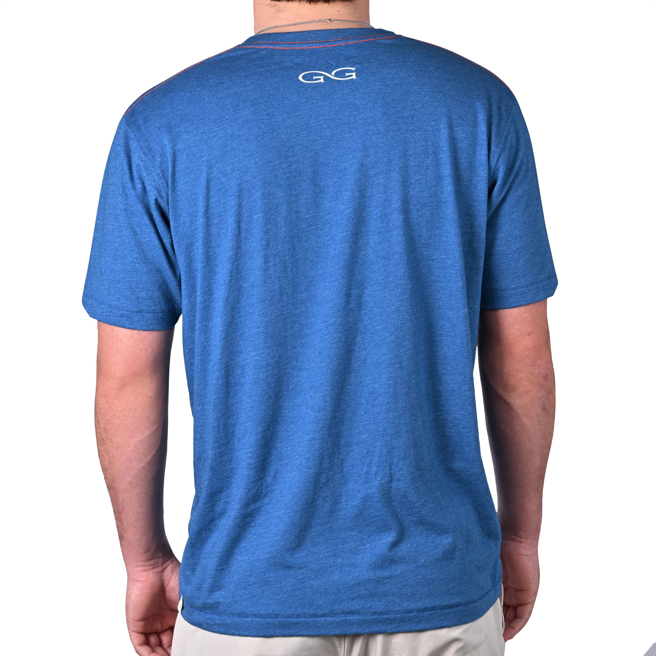 Blue t-shirt with a logo on the back worn by a person, on a white background