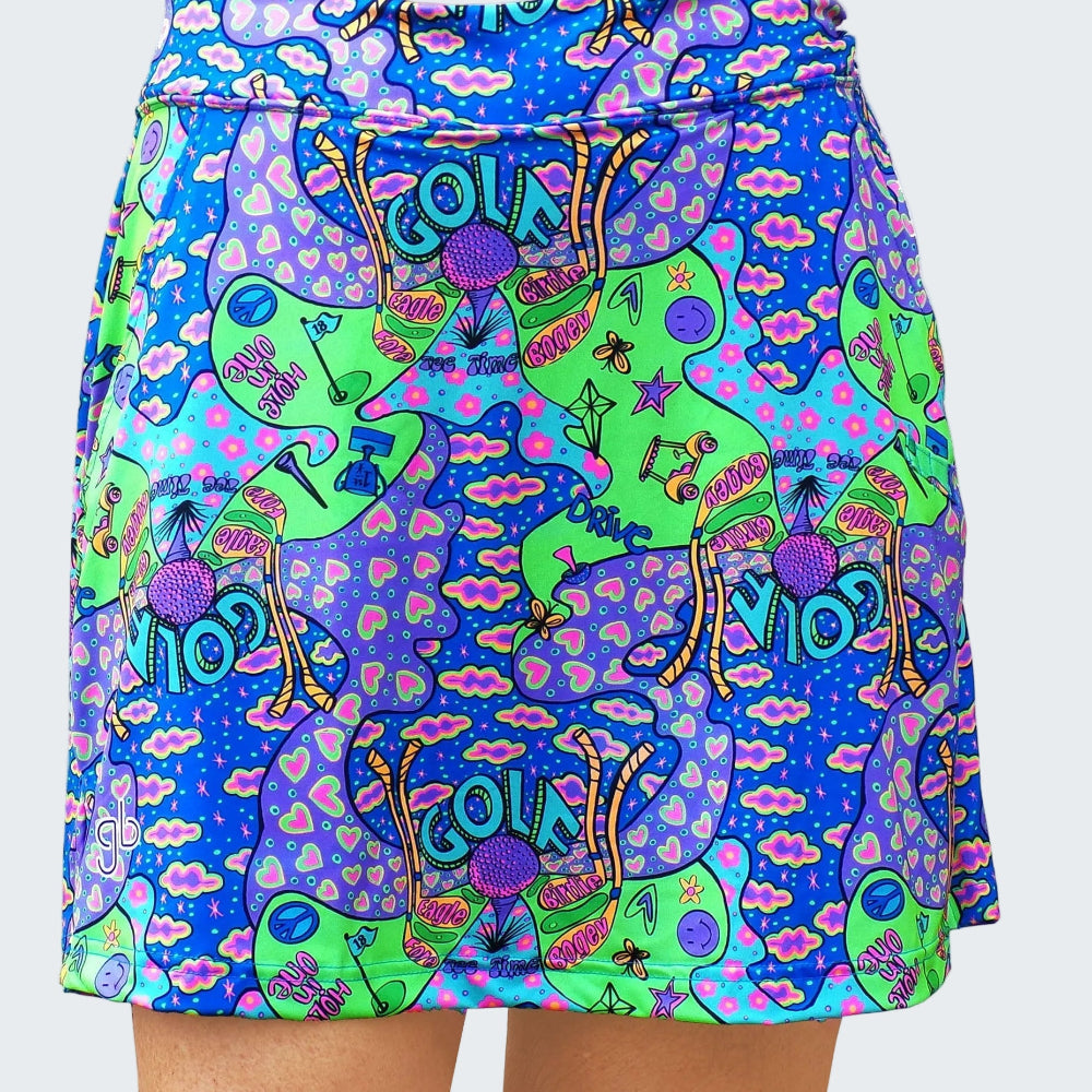Colorful patterned skirt with cartoon characters and text on a white background