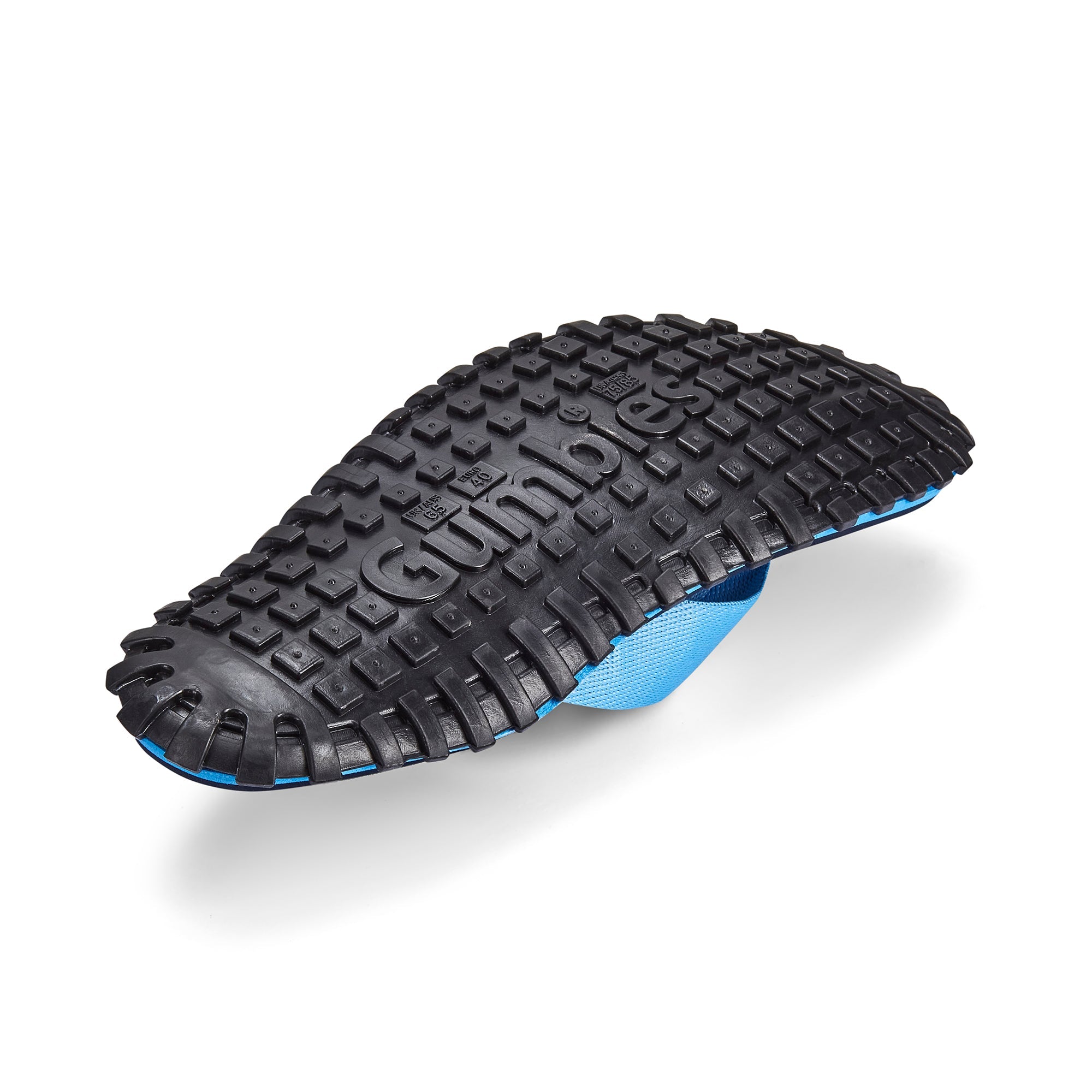 Black and blue sole of a shoe with Gumbies branding on a white background