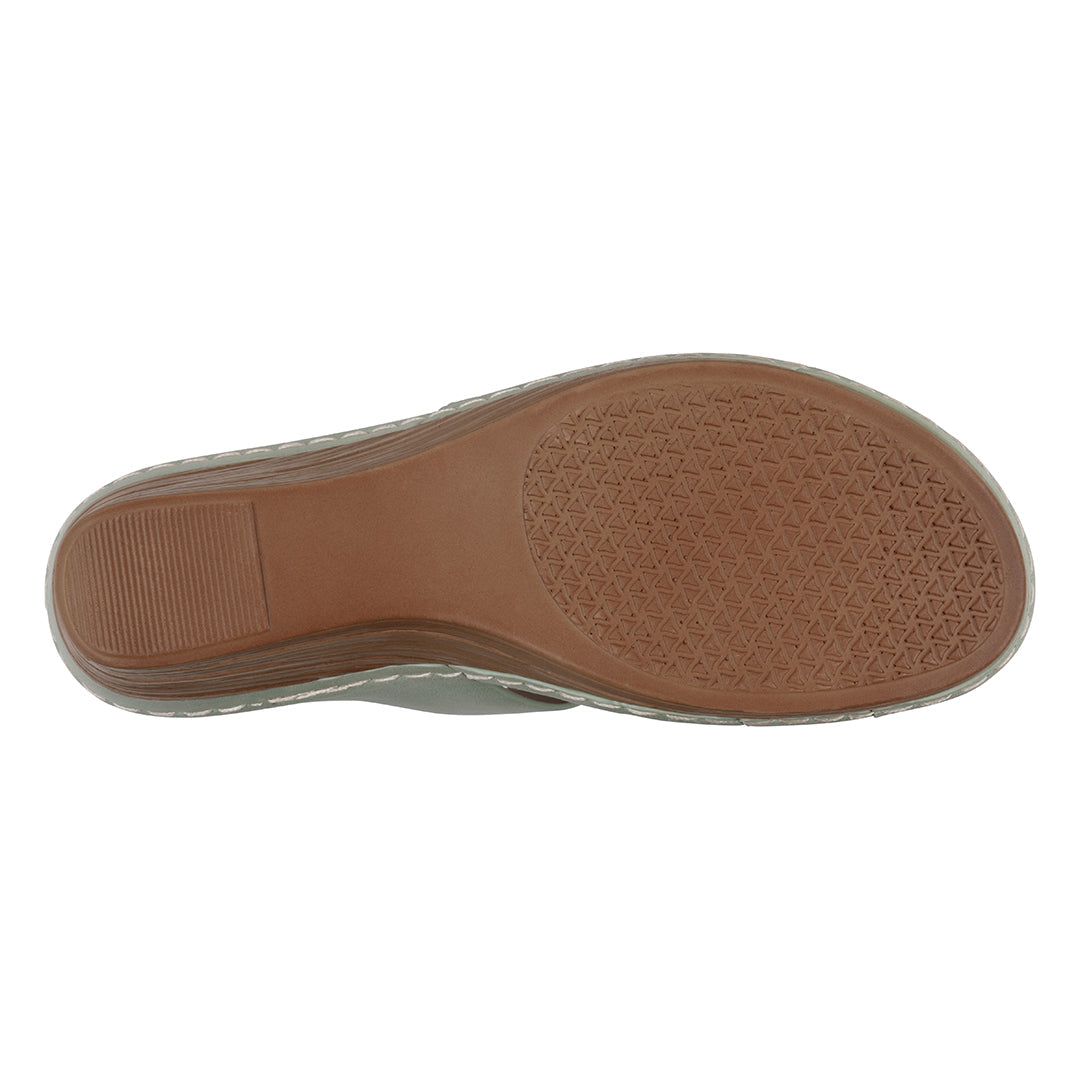 Brown sole of a shoe on a white background