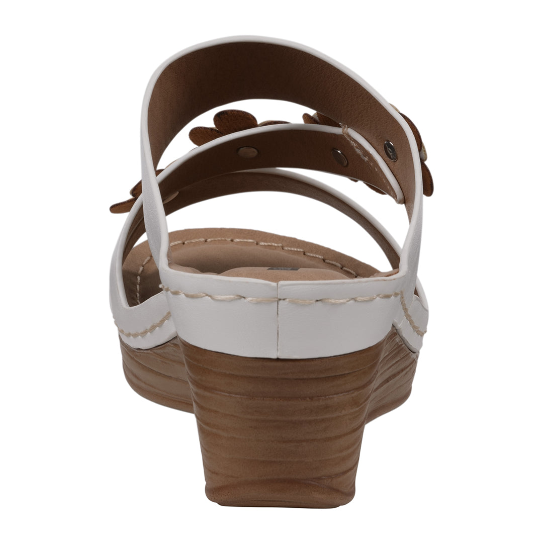 Brown sandal with white straps on a white background