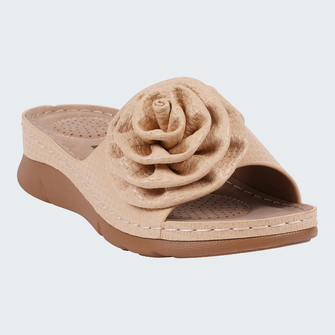Beige sandal with a floral design on a white background
