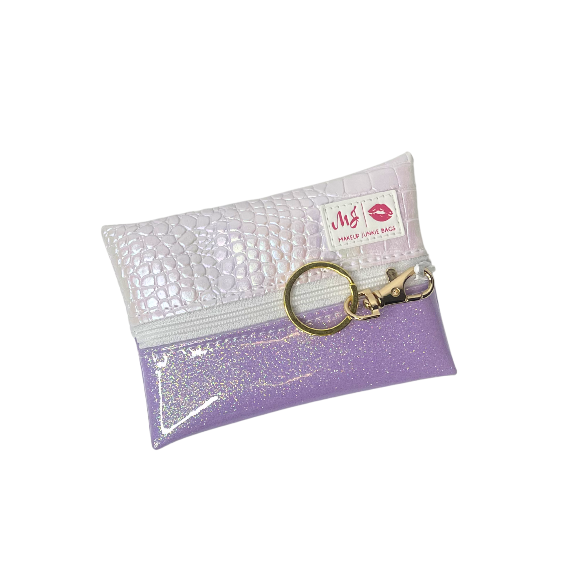 White and purple glittery pouch with a keychain on a white background