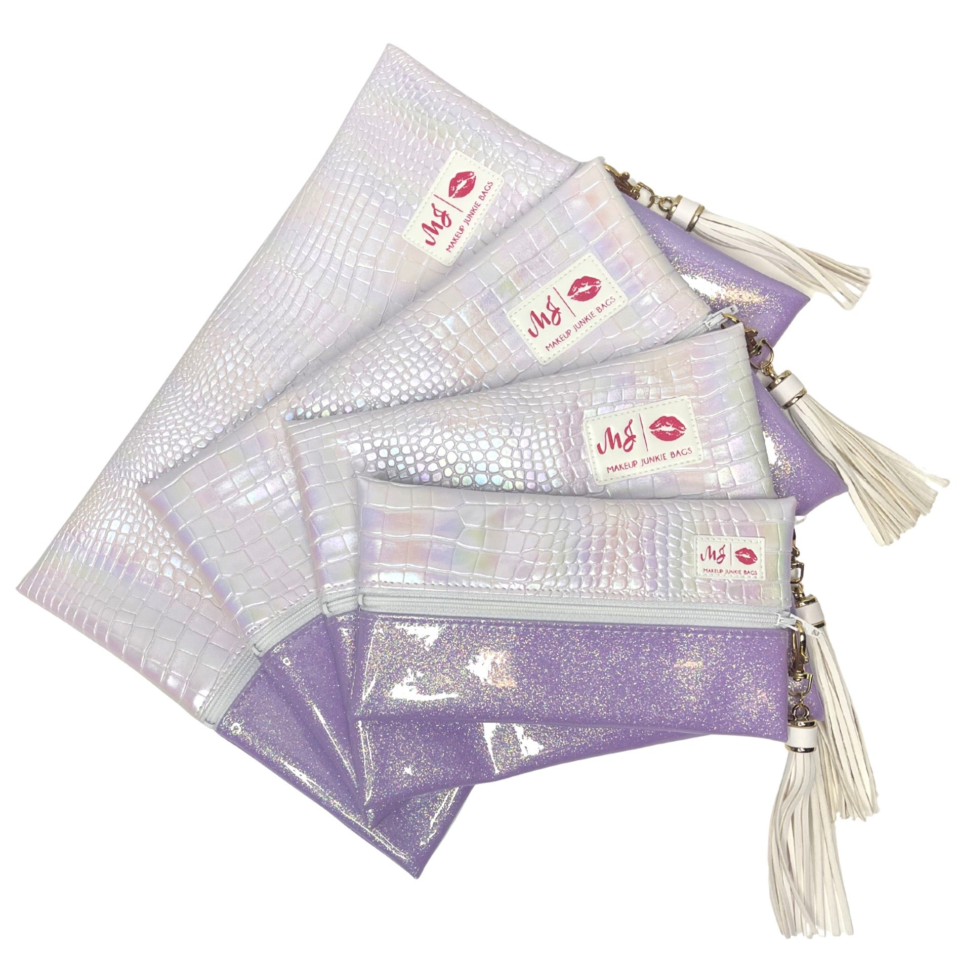 Set of purple pouches with tassels and visible brand logo on a white background
