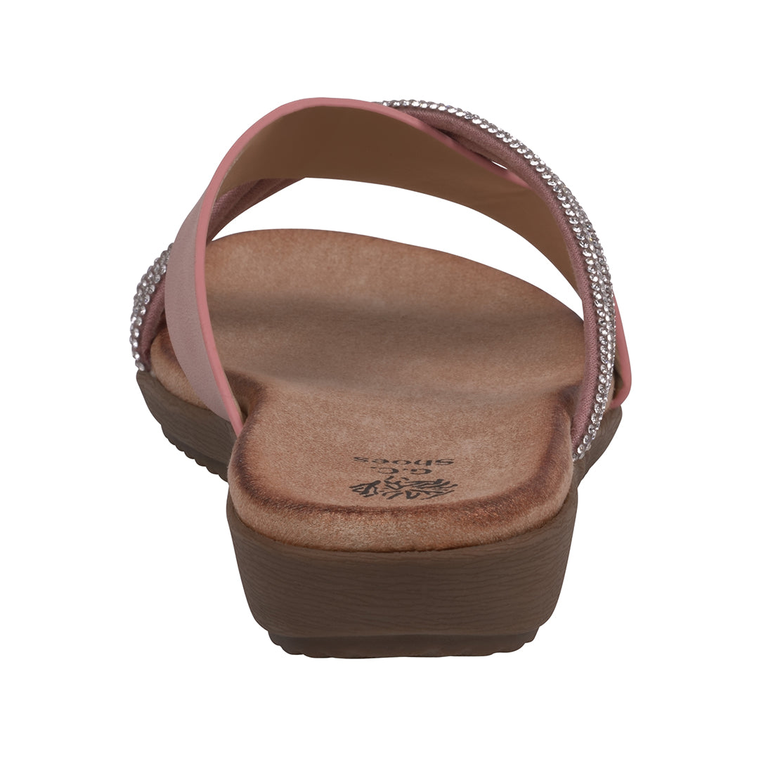 Pink sandal with brown sole on a white background