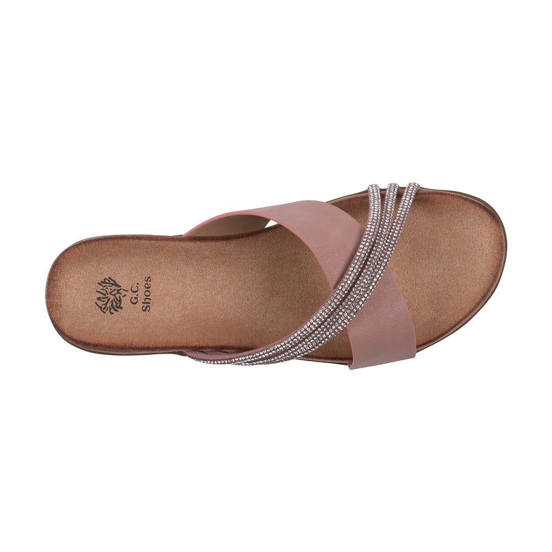 Pink sandal with rhinestone straps on a white background