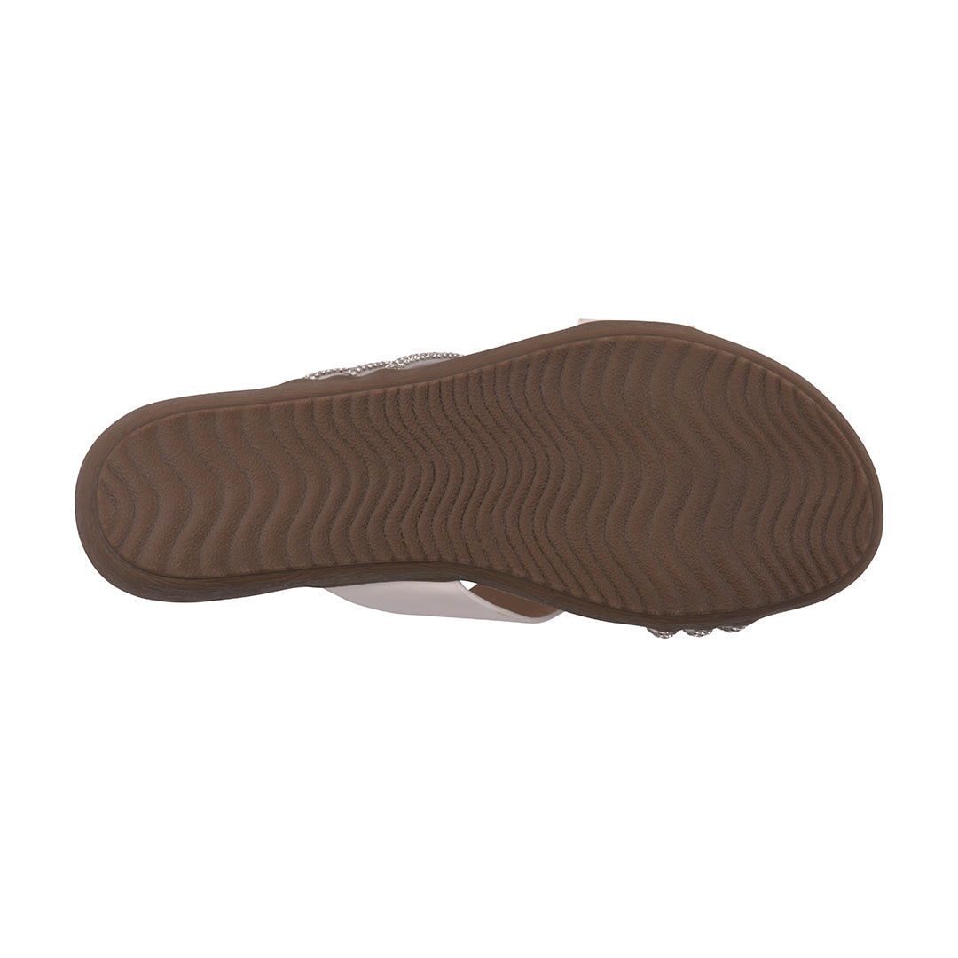 Brown sole of a shoe on a white background