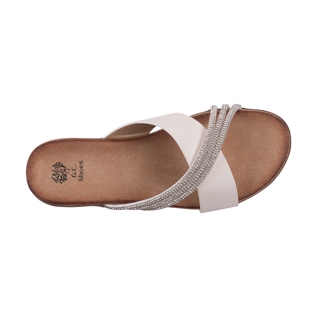 Sandal with a white strap and brown sole on a white background