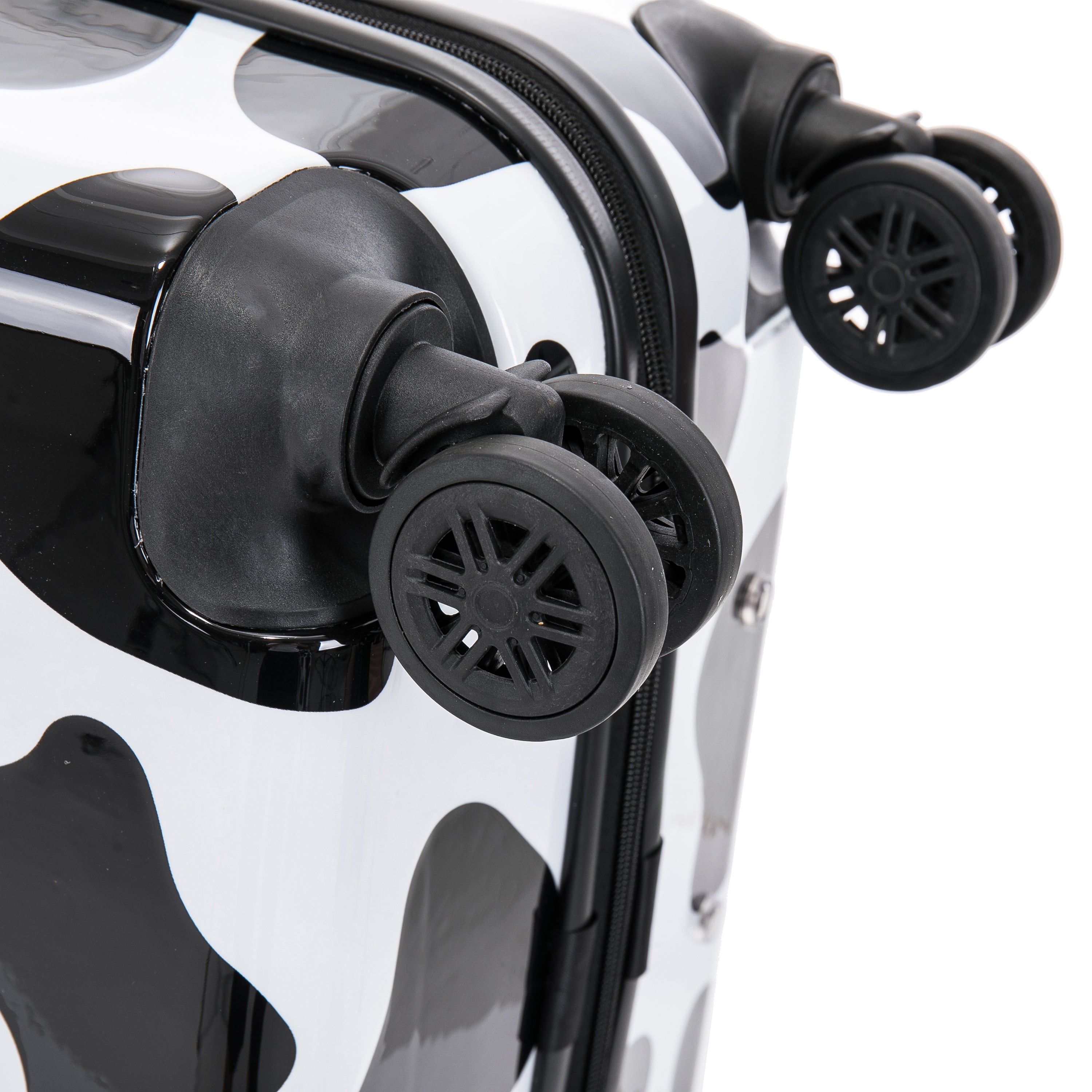 Close-up of a suitcase with black wheels on a white background