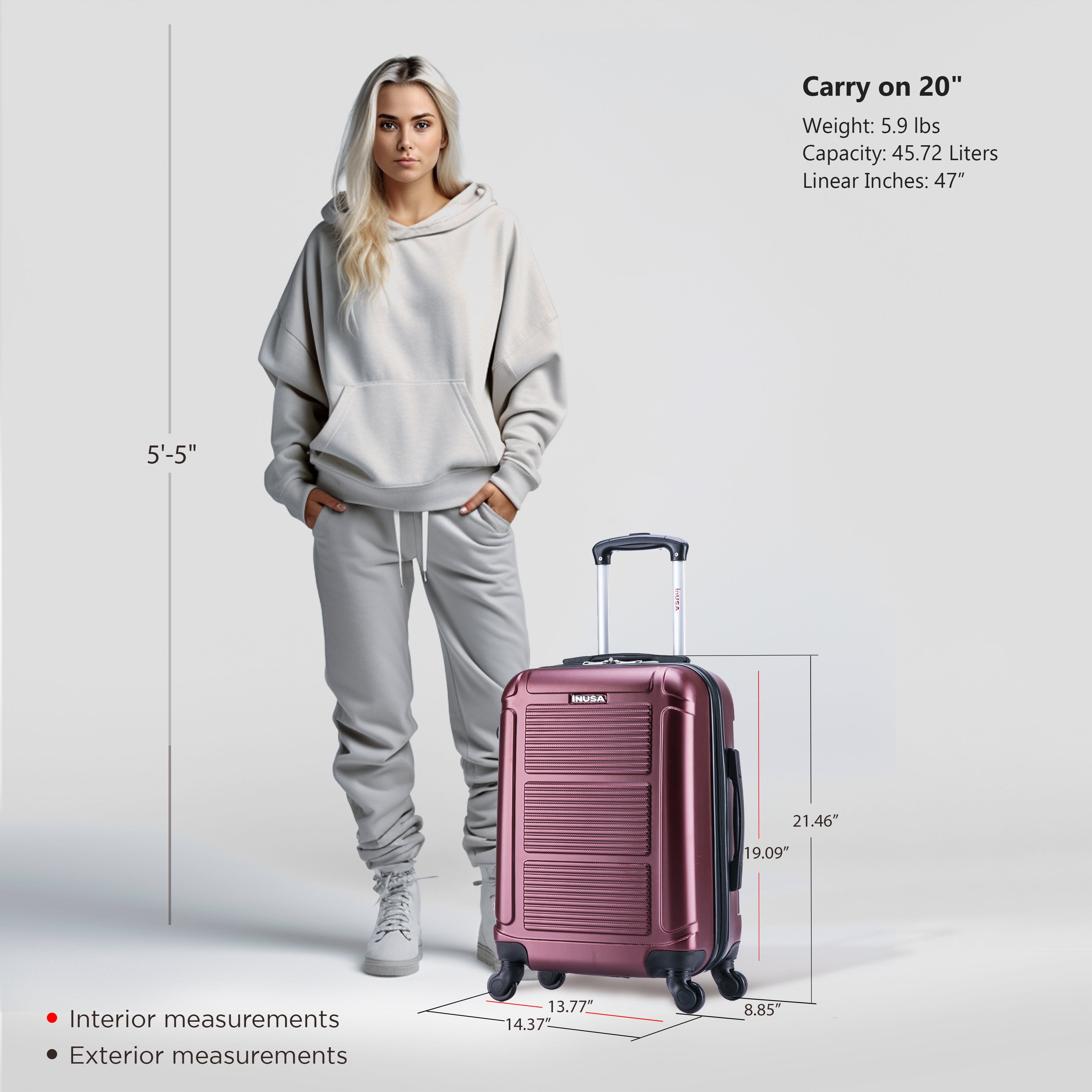 Person in gray outfit standing next to a pink suitcase with measurements displayed.