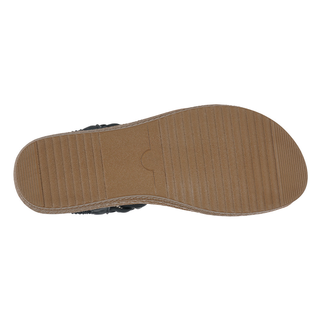 Brown sole of a shoe on a white background