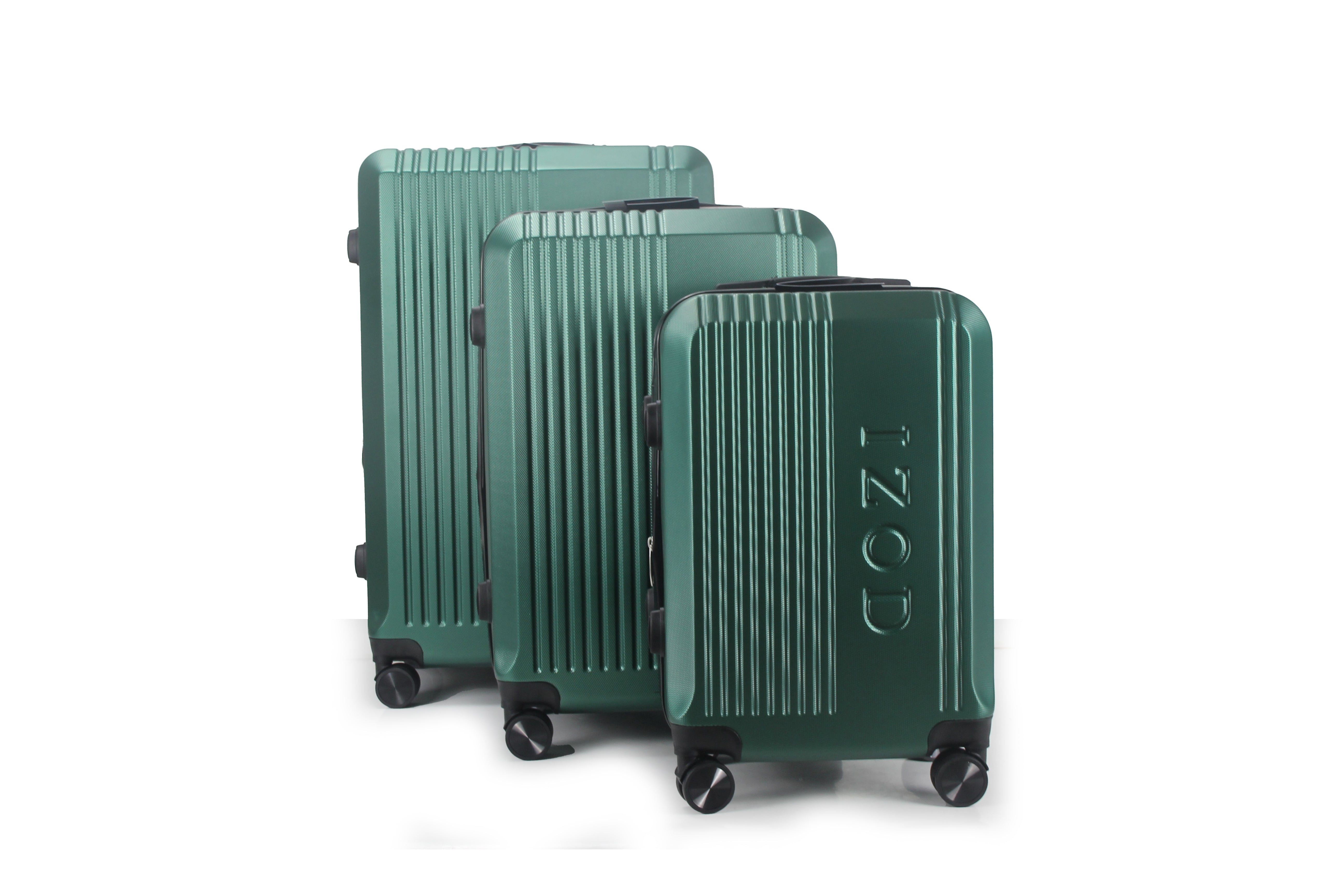 Set of three green suitcases with 'COZZI' branding on a white background