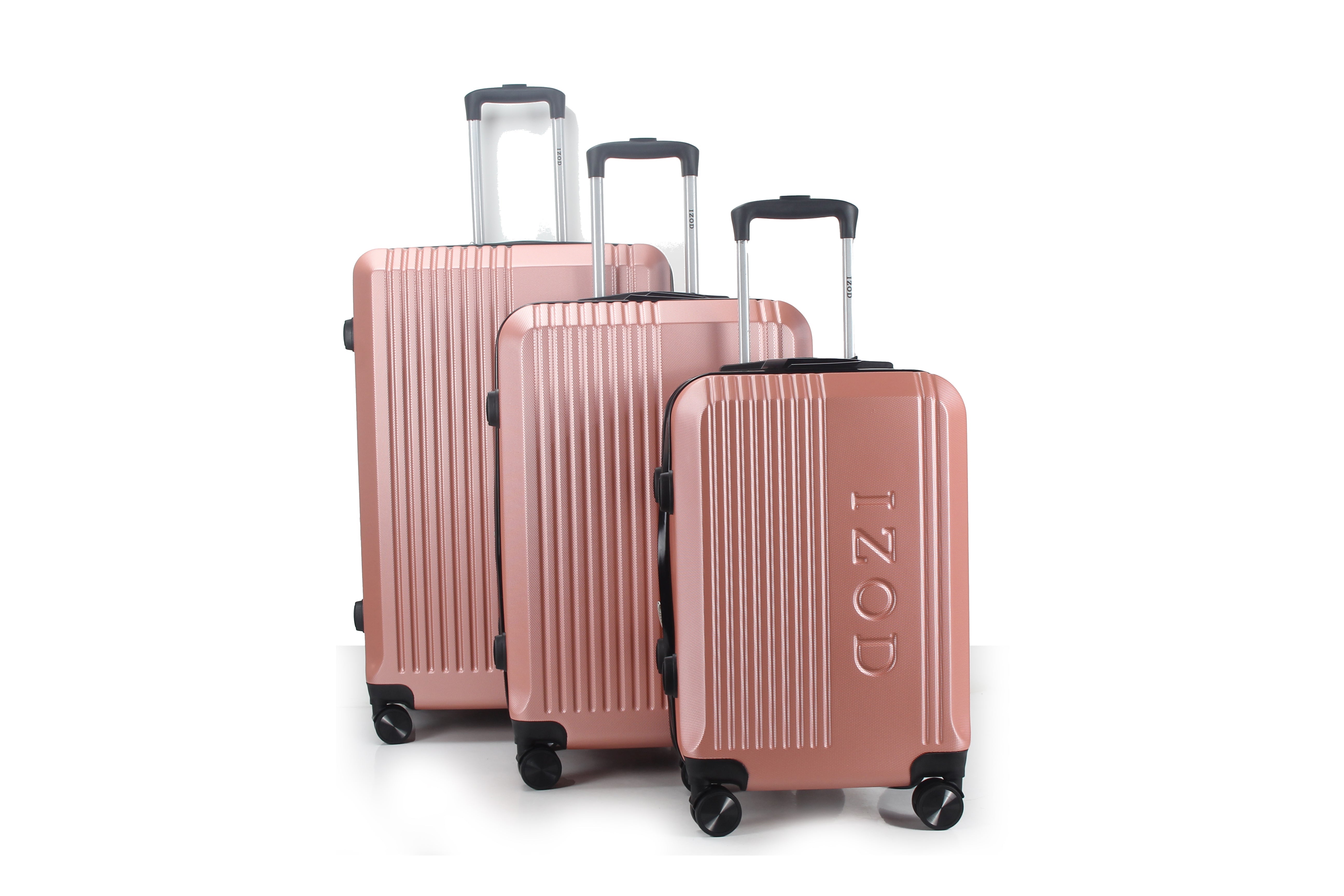Set of three rose gold suitcases with 'IZOD' branding on a white background