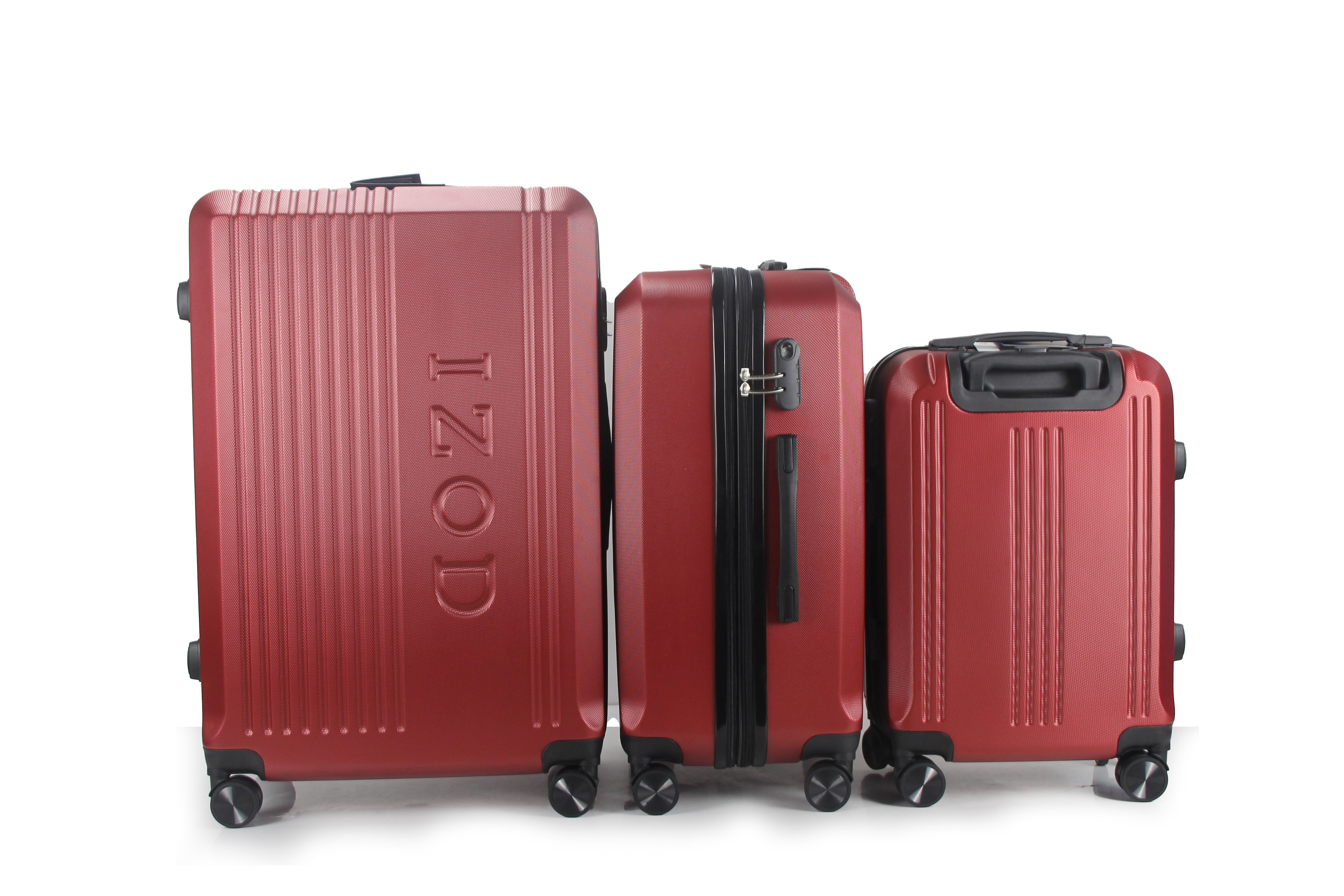 Three red suitcases of different sizes with 'IZOD' branding on a white background