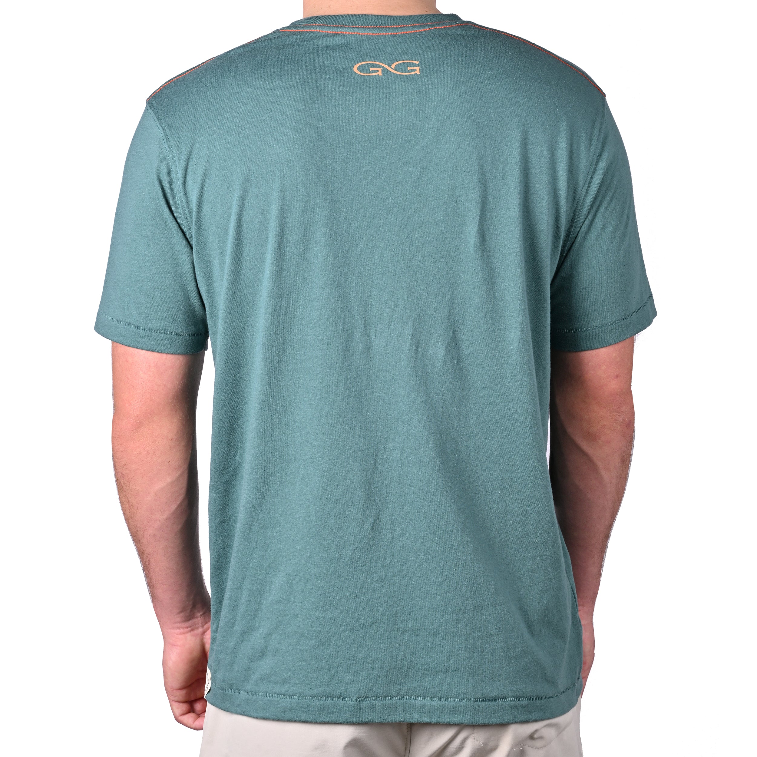 Green t-shirt with a logo on the back worn by a person, on a white background