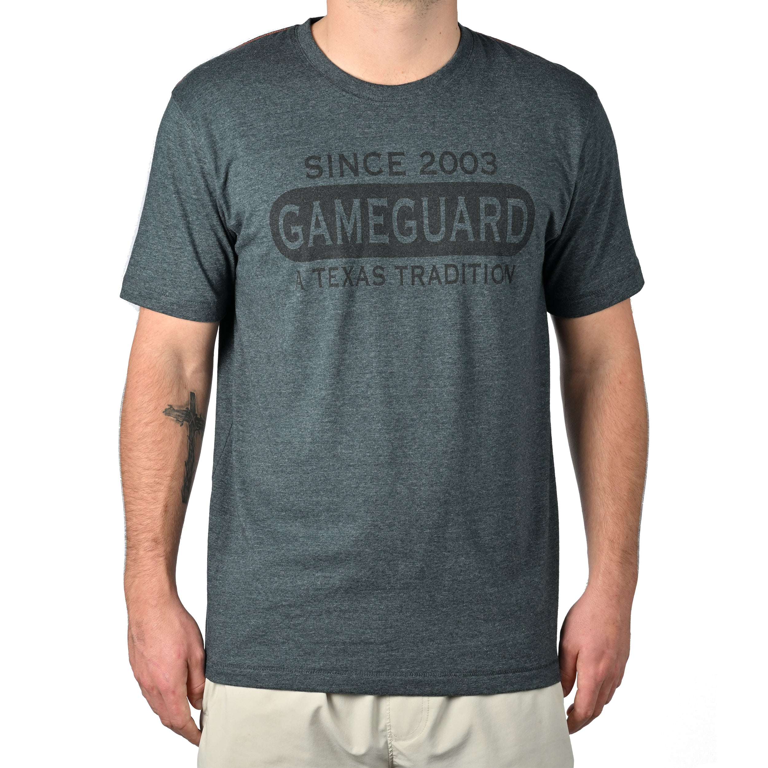 Person wearing a gray t-shirt with 'Gameguard' text on a white background