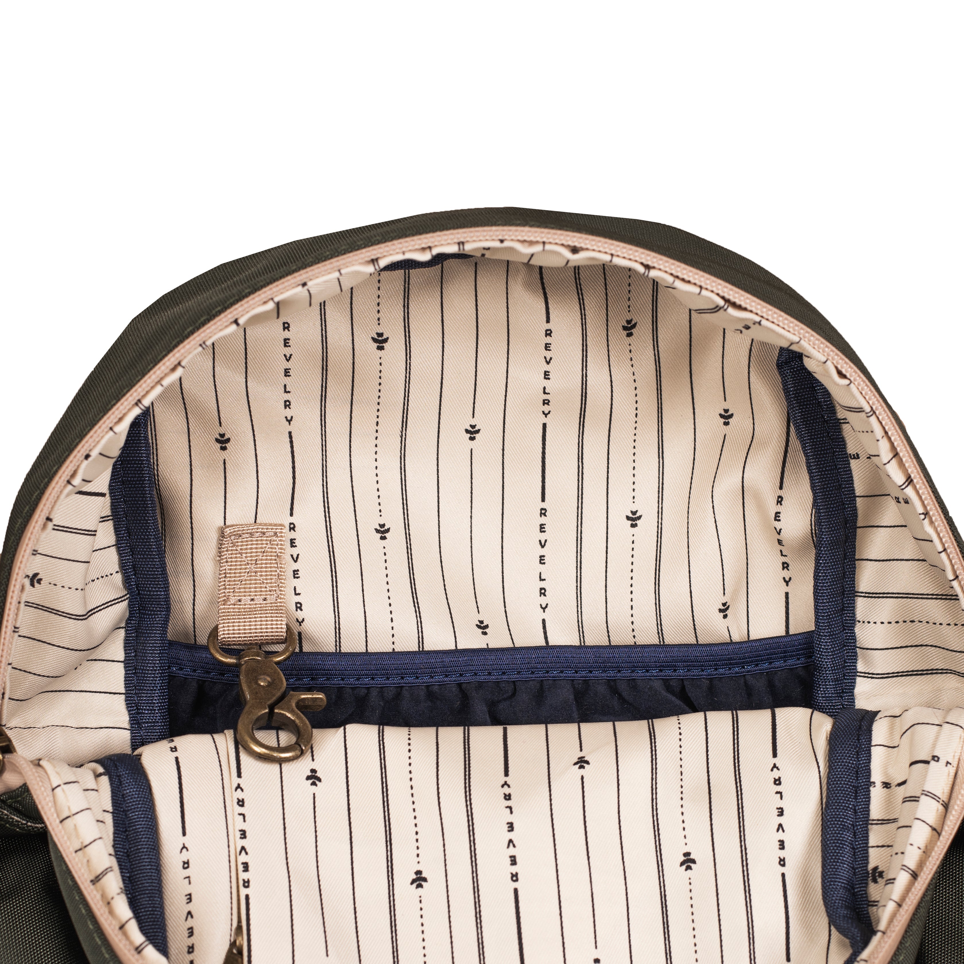 Close-up of a backpack interior with striped pattern and blue strap.