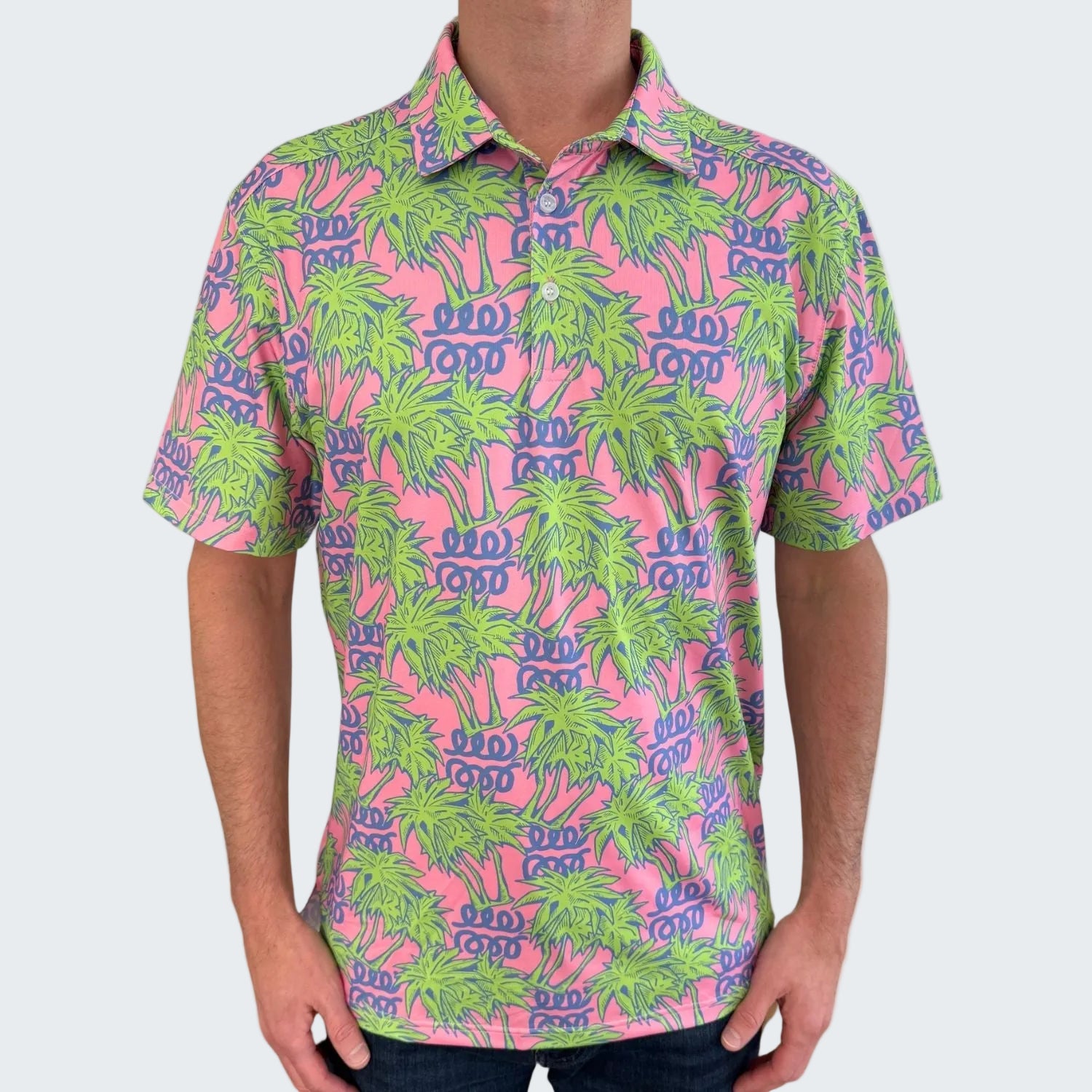 Short-sleeve shirt with a colorful palm tree pattern on a white background