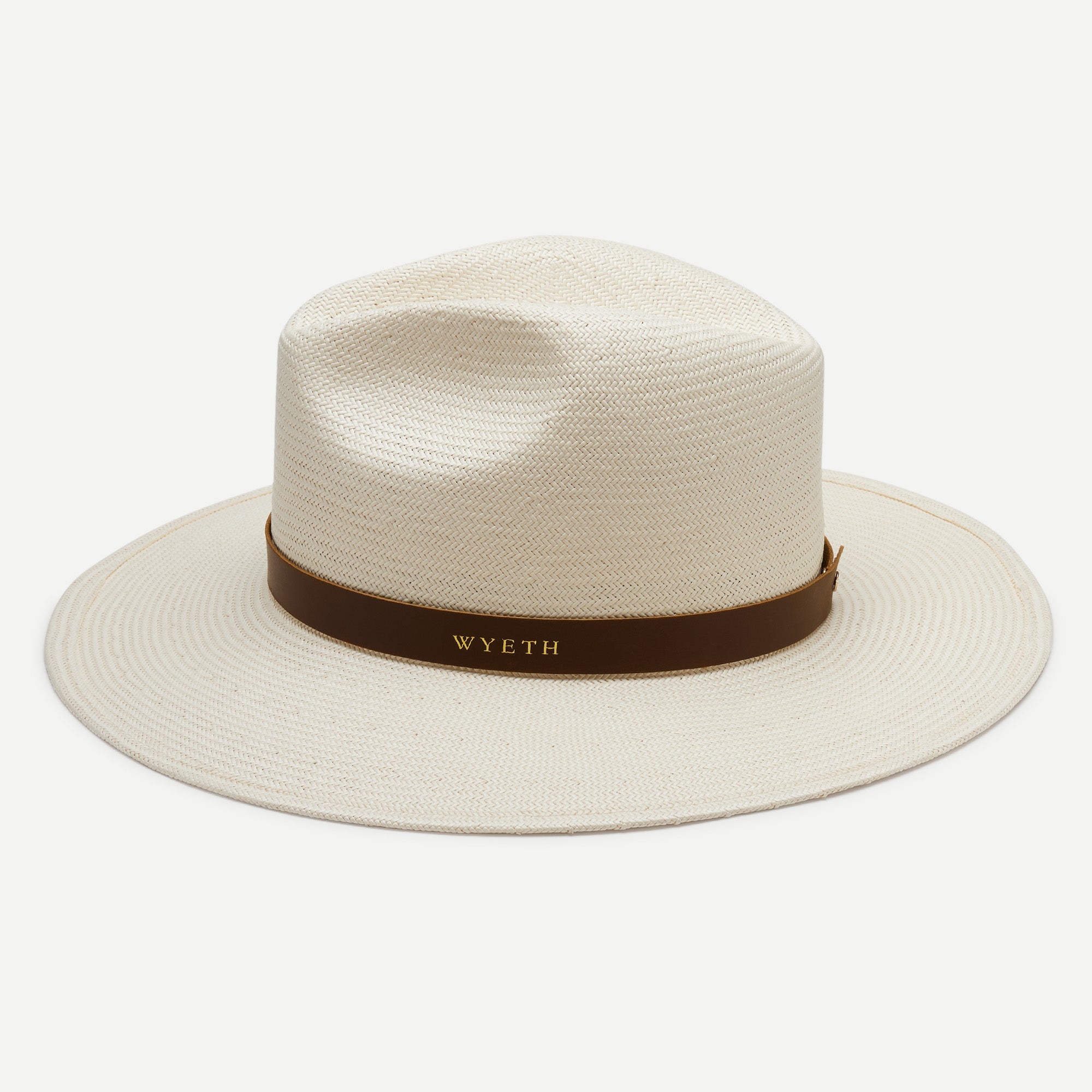 Beige straw hat with a brown band on a white background