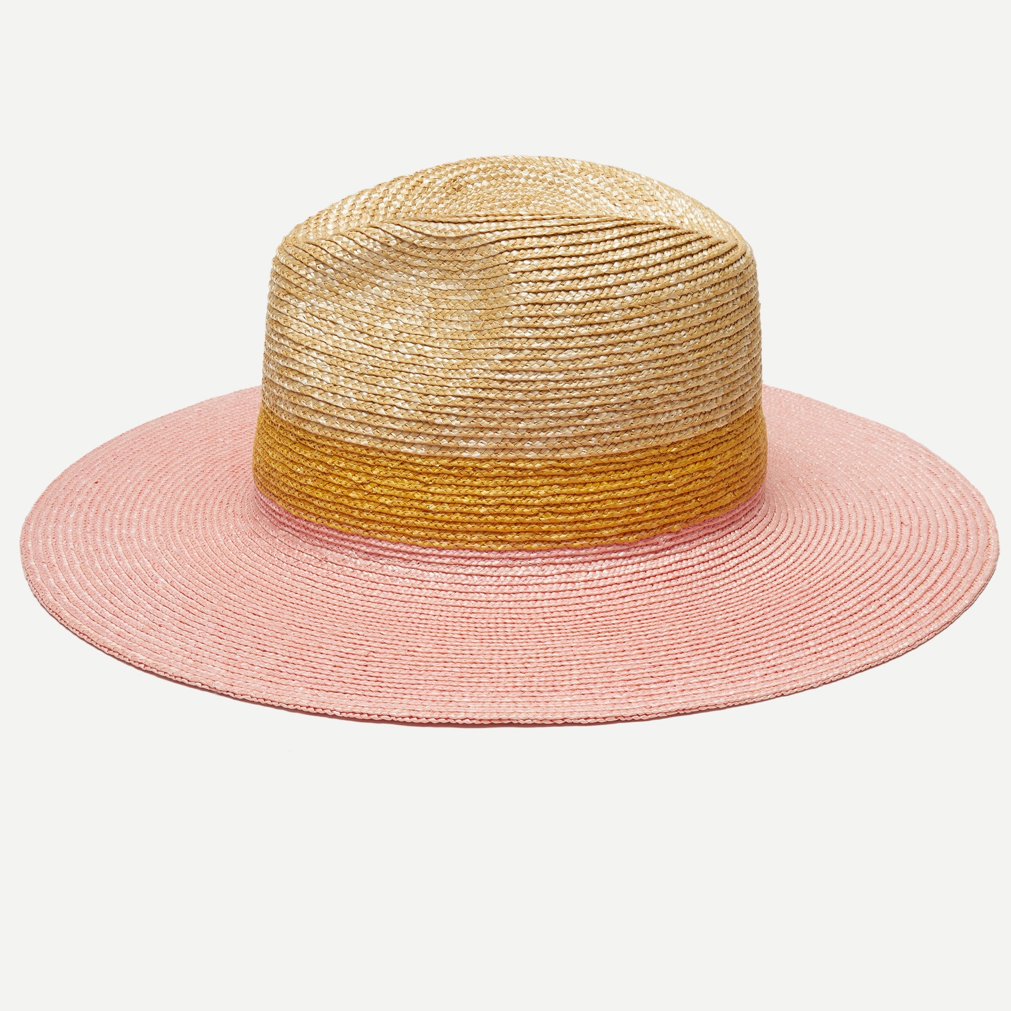 Straw hat with pink brim and yellow band on a white background