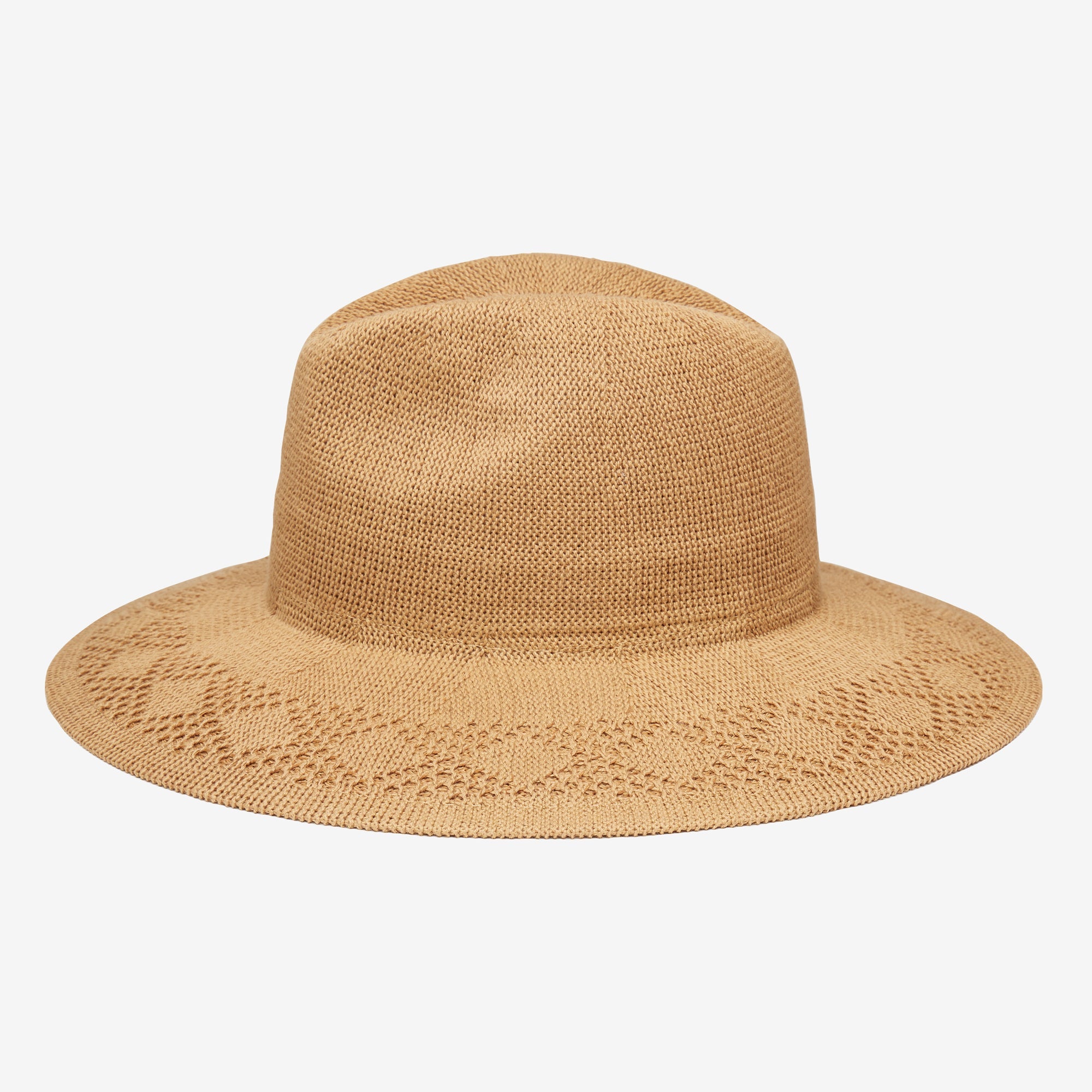 Beige straw hat on a light beige background