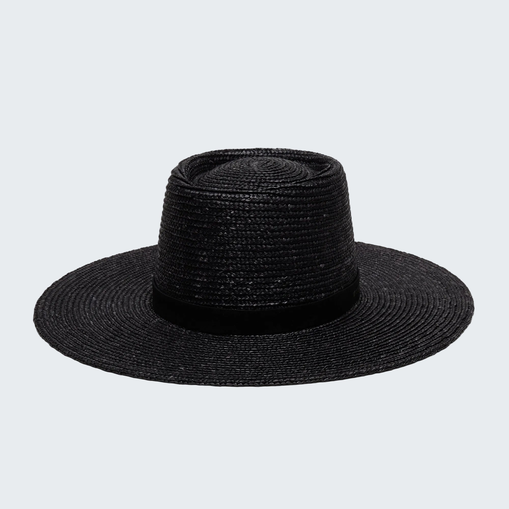 Black straw hat on a white background