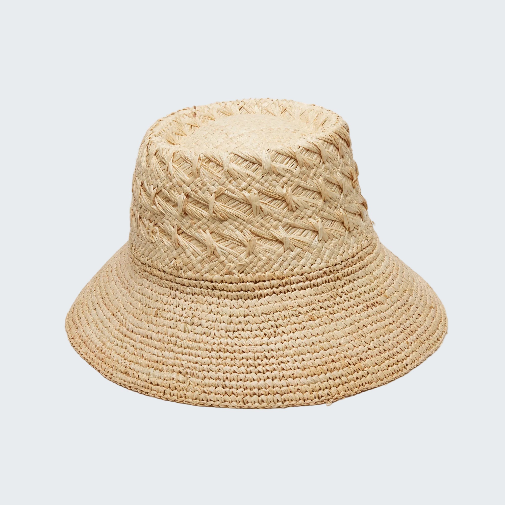 Beige woven bucket hat on a white background