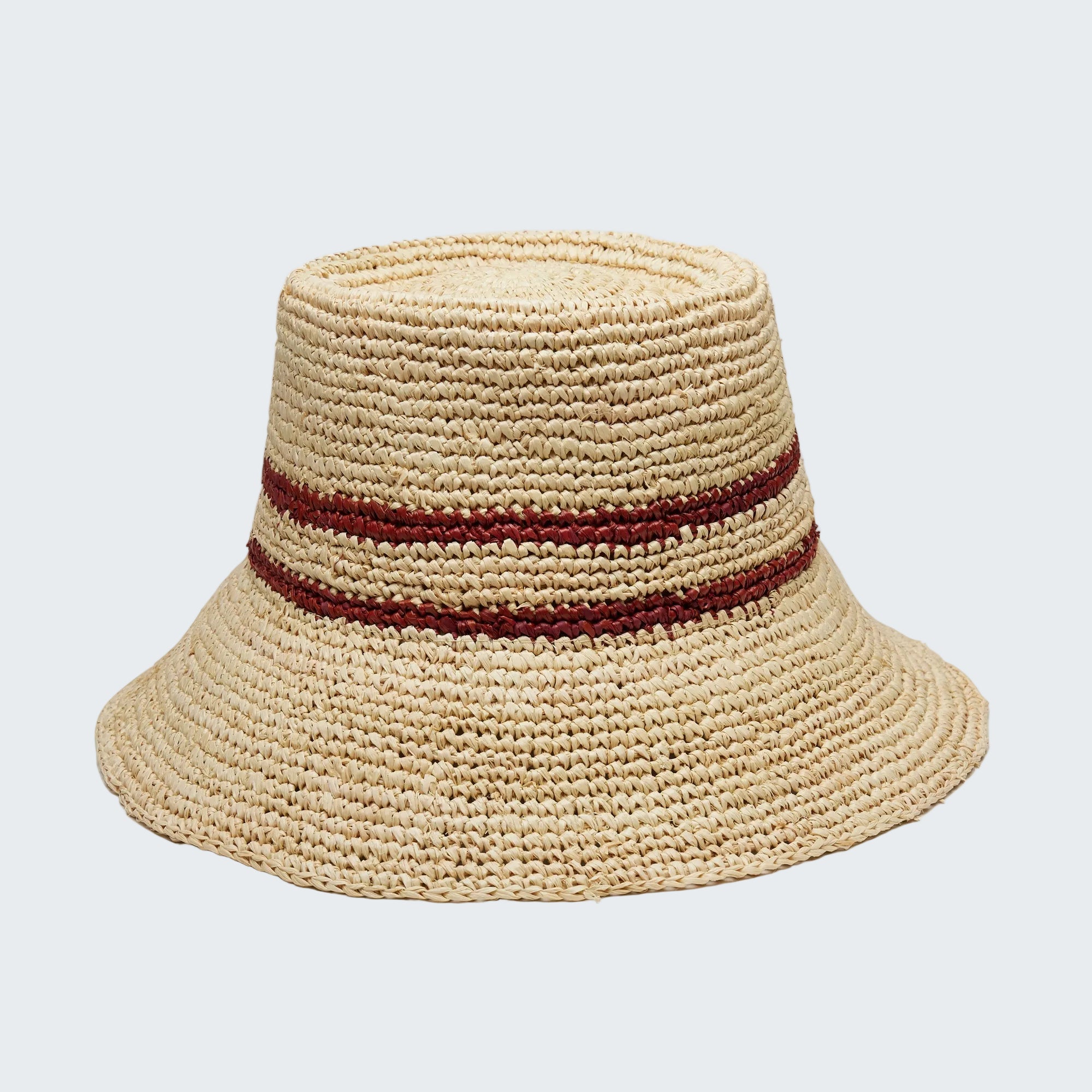 Beige straw hat with a red band on a white background