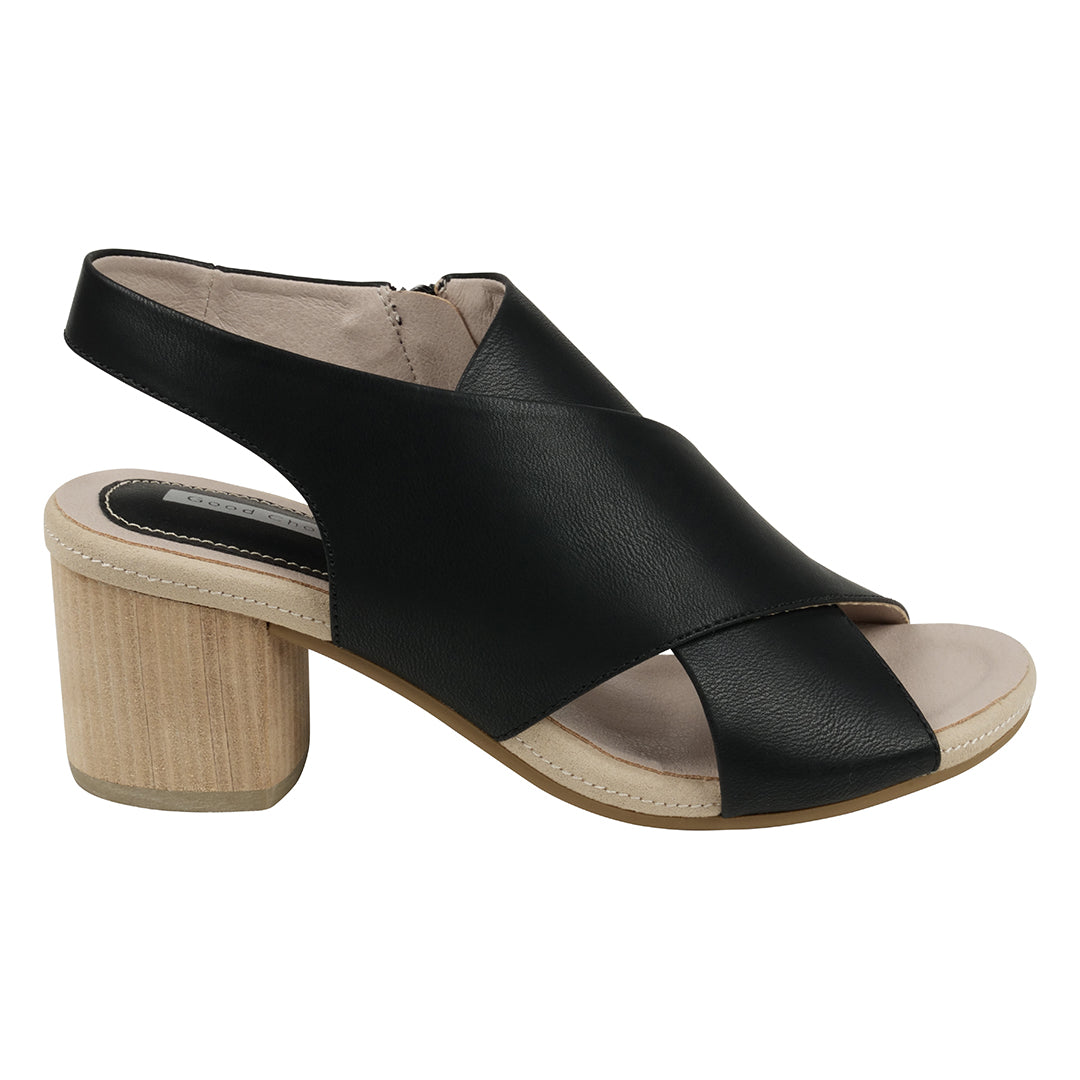 Black sandal with a wooden heel on a white background