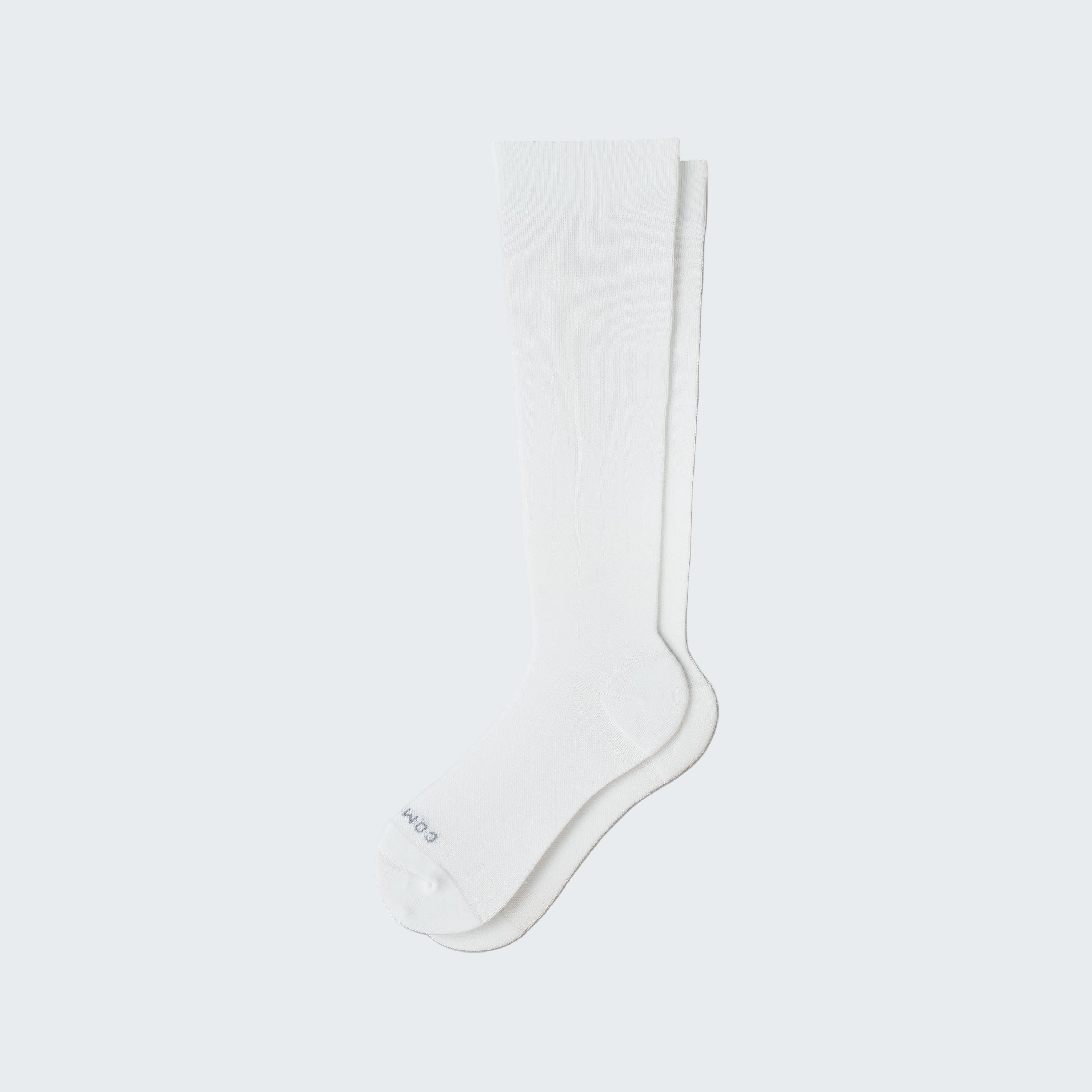 White knee-high sock on a white background