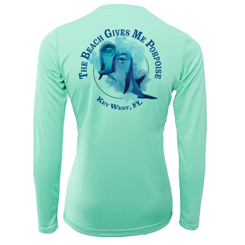 Mint green long-sleeve shirt with dolphin graphic and text on a white background