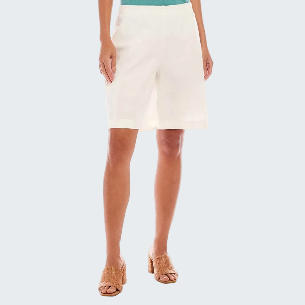 Person wearing a white skirt on a white background