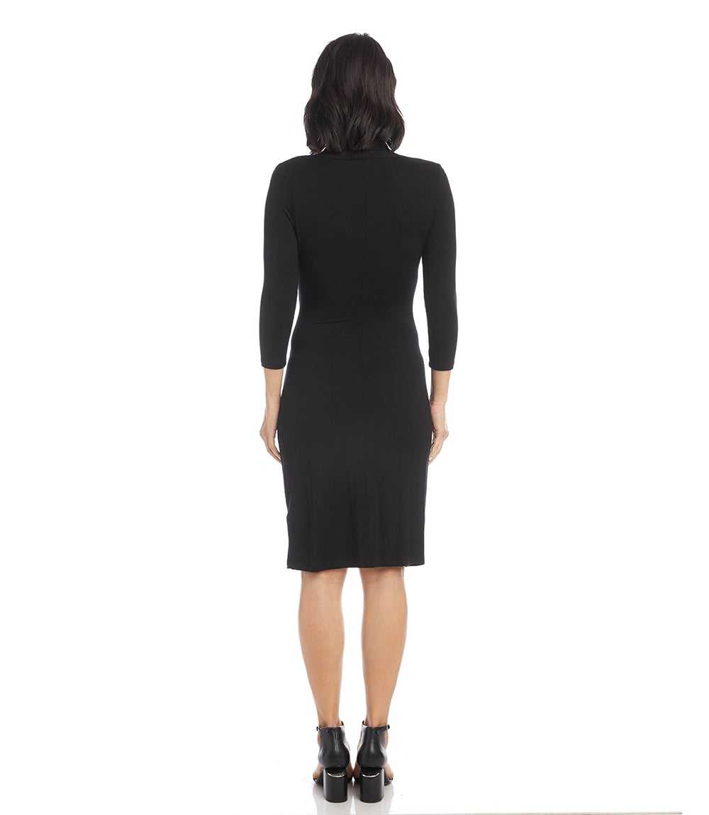 Black dress worn by a person on a white background