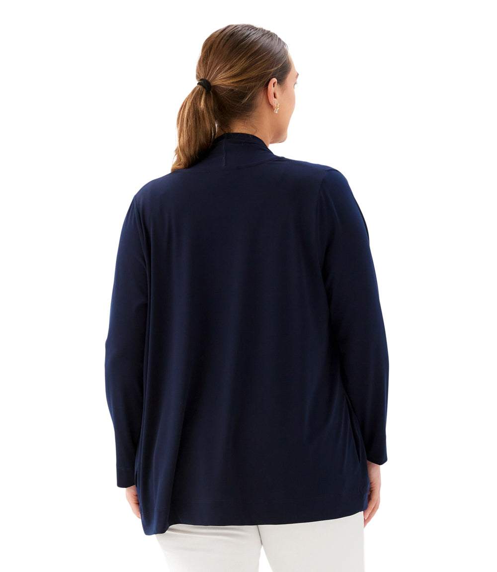 Woman wearing a navy blue jacket on a white background
