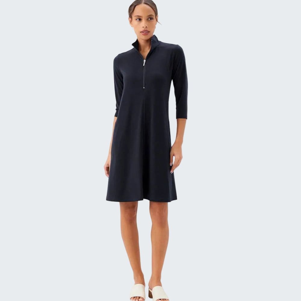 Woman wearing a black dress with a zipper on a white background