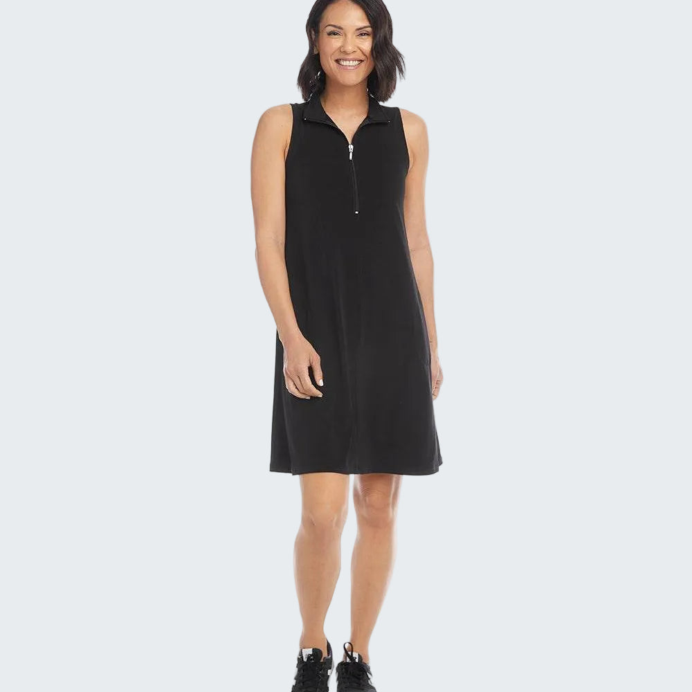 Woman wearing a black sleeveless dress with a zipper on a white background