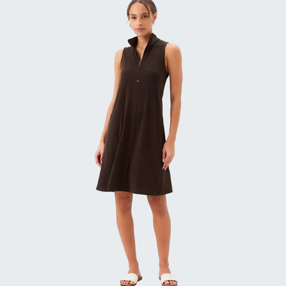 Woman wearing a brown sleeveless dress on a white background