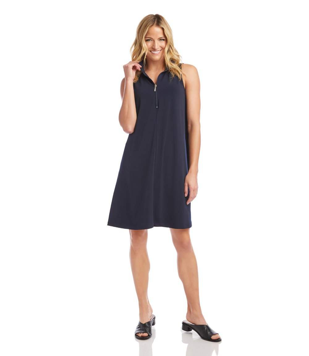 Woman wearing a navy sleeveless dress on a white background