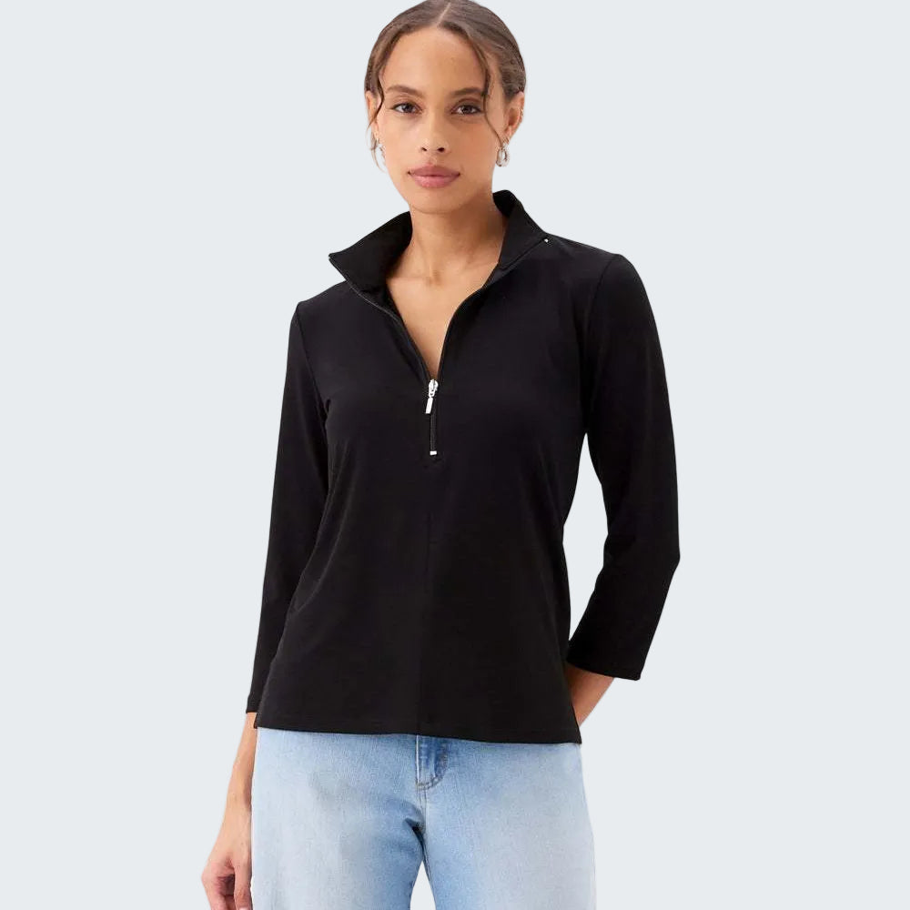 Woman wearing a black long-sleeve top with a zipper on a white background