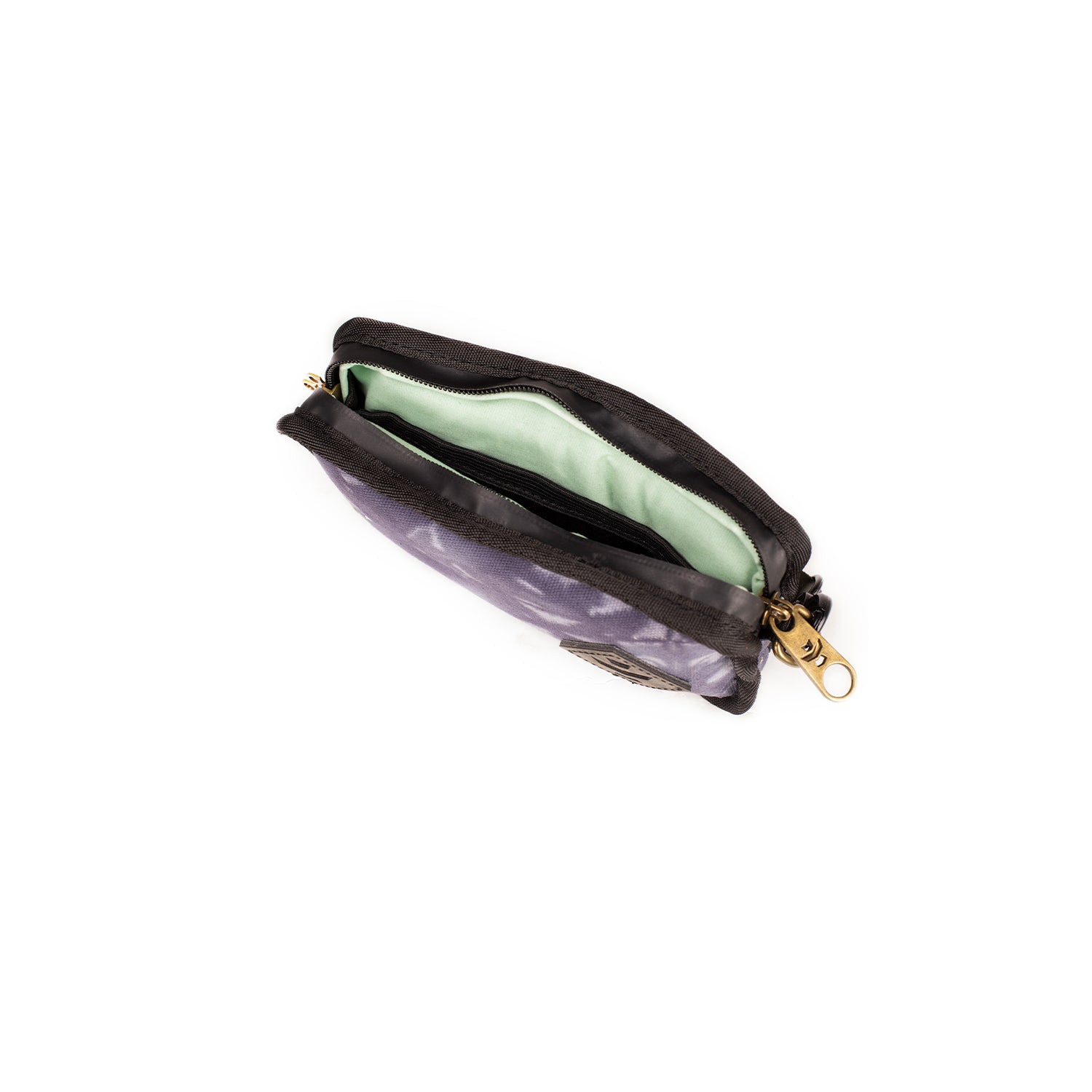 Purple handbag with gold zipper on a white background