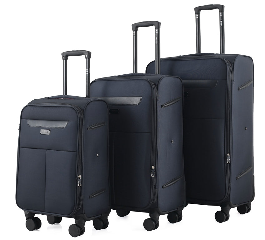 Three navy blue suitcases of different sizes on a white background